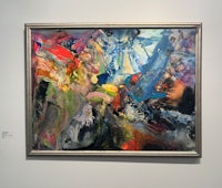 an abstract painting on display in an art museum