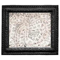 a black frame with an ornate pattern on it
