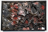 a black and red painting on a white background