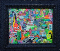 a colorful painting in a black frame