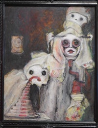 a painting of two dolls in a black frame