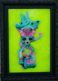 an image of a stuffed animal in a black frame